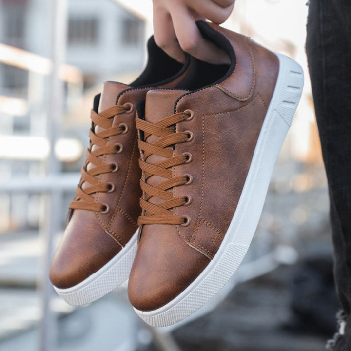 Close-up of men's comfort sneakers, highlighting detailed craftsmanship, stylish design, and everyday comfort.