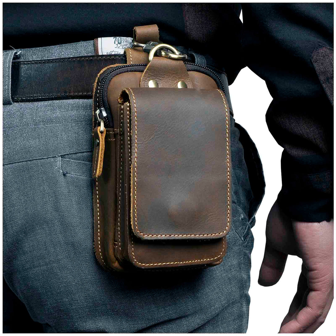 Men's elegant dark brown leather waist bag, secure & versatile for everyday carry.