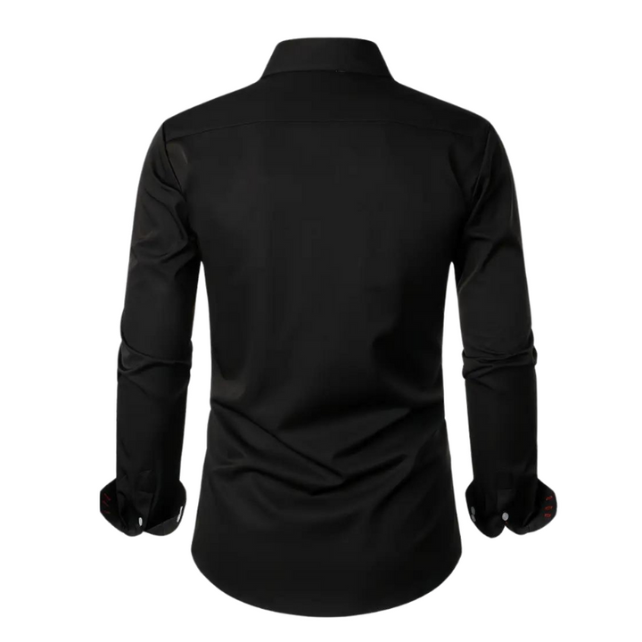 Man adjusting cuff of a stylish slim fit men's party shirt, long sleeve, elegant and sophisticated.