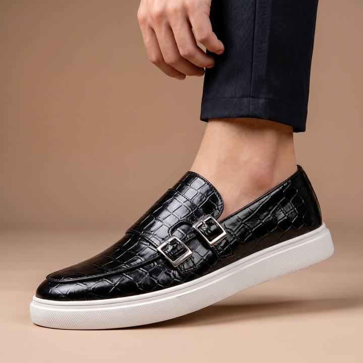 Men's elegant slip-on loafers with cushioned comfort, perfect for dress or casual wear. Classic buckle detail.