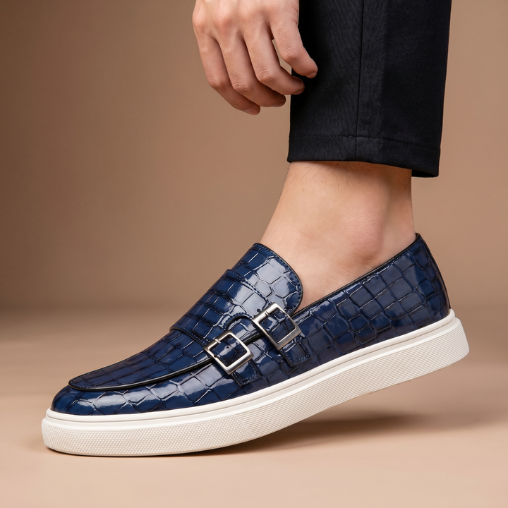 Elegant men's slip-on loafers featuring a buckle detail & comfortable cushioned platform sole. Versatile dress shoes.