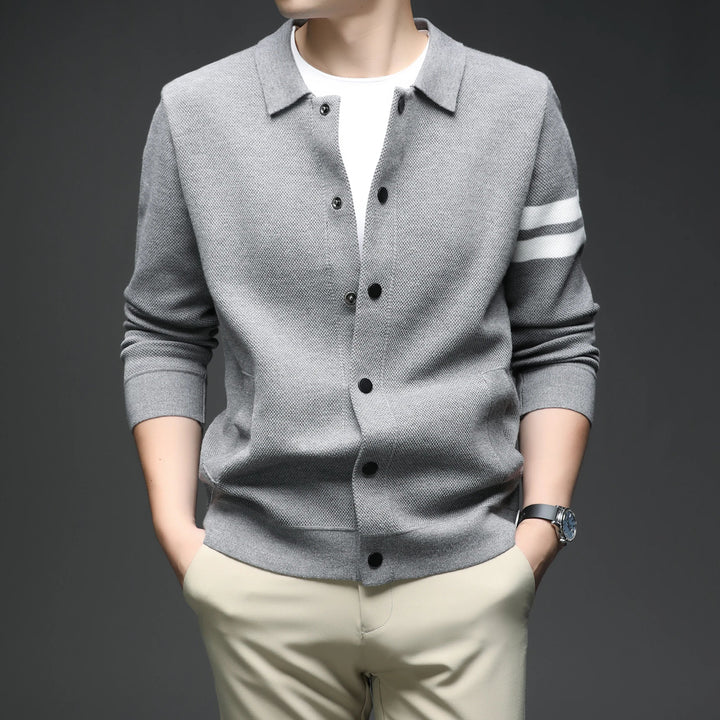 Men's striped button-up cardigan jacket for casual or smart casual layering, a key transitional piece.
