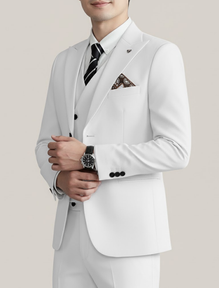 Stylish men's three-piece wedding suit. Ideal groom attire or guest formal wear for special events.