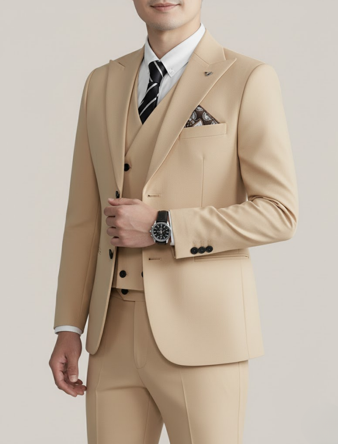 Sophisticated men's slim fit three-piece suit, showcasing modern men's fashion. Elegant for any special occasion.