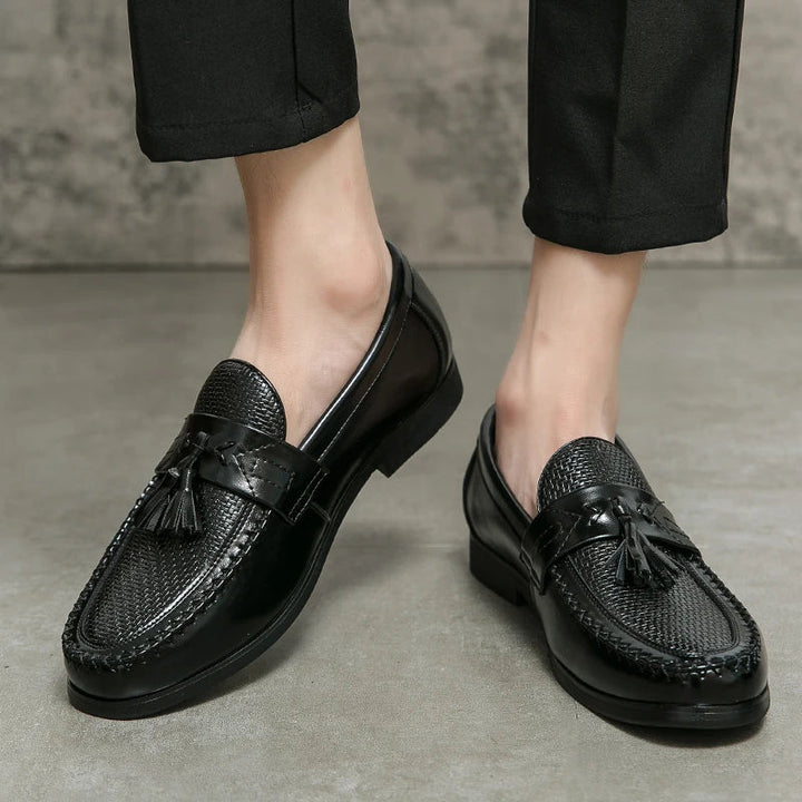 Comfortable men's slip-on woven loafers with stylish tassels, ideal for everyday wear.