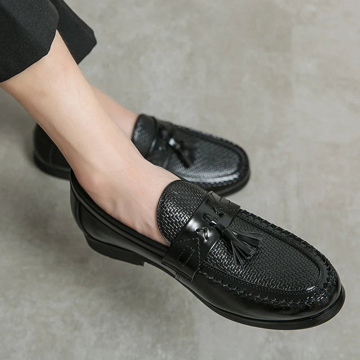 Stylish men's woven tassel loafers. Perfect for smart casual or dressy occasions, offering comfort.