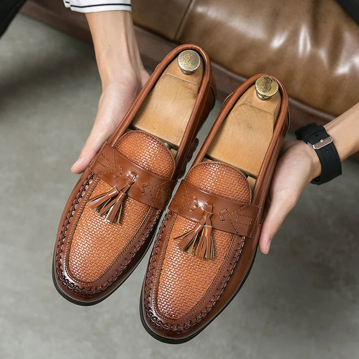 Classic gentleman's woven tassel loafers. Elegant men's footwear, comfortable for any occasion.