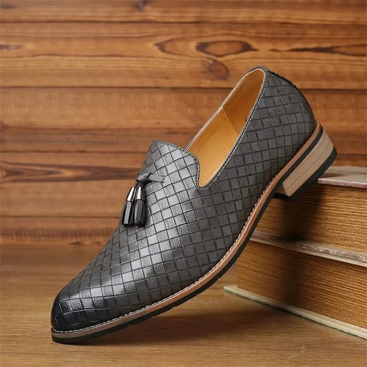 Refined men's woven tassel loafers. Versatile footwear, perfect for formal, casual, or business attire.