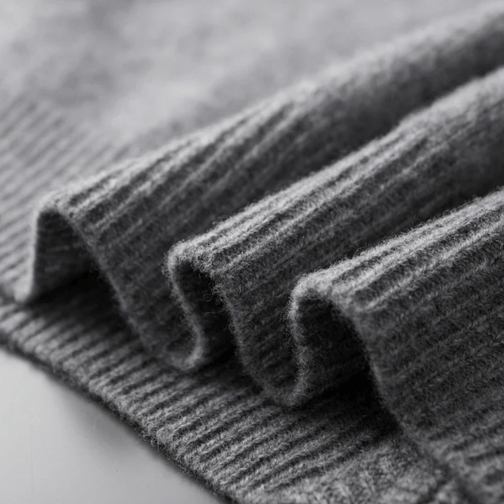 Men's smart casual zip-up cardigan, offering a refined and comfortable knitwear layering option.