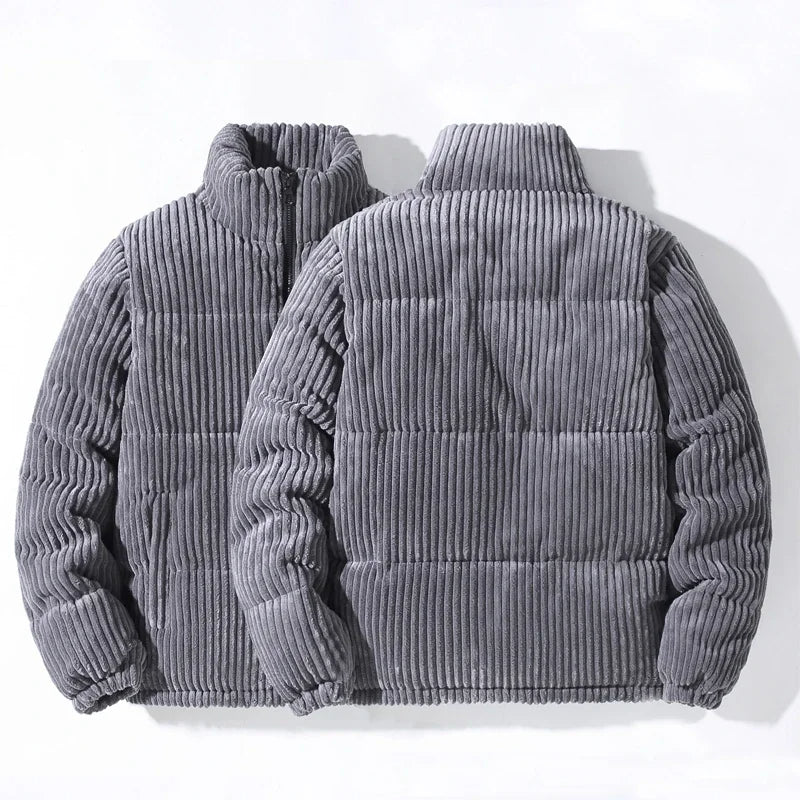 Close-up of the quilted detail on an elevated men's puffer jacket, showcasing texture.
