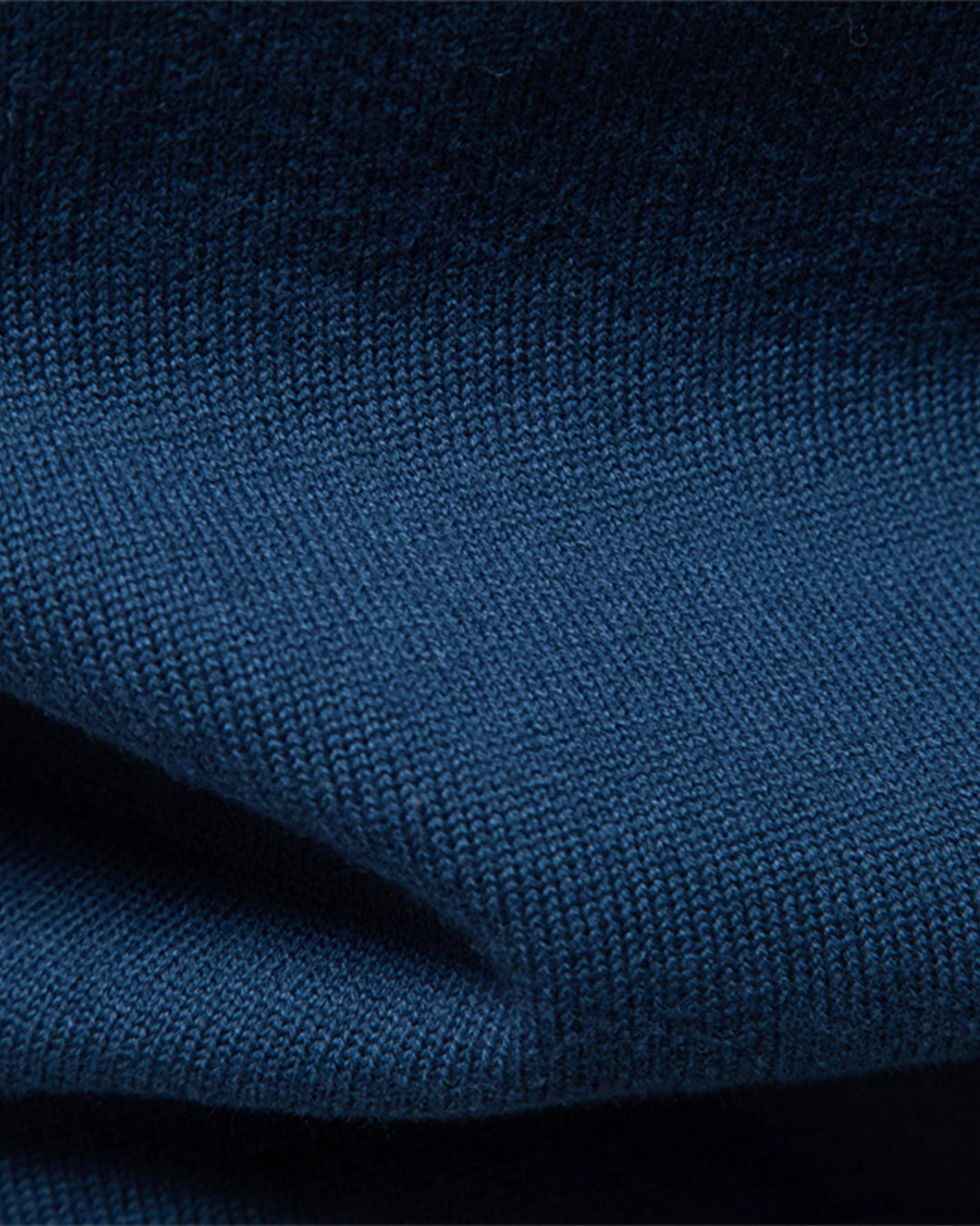 Men's elevated crewneck sweater in forest green, featuring a unique textured knit.