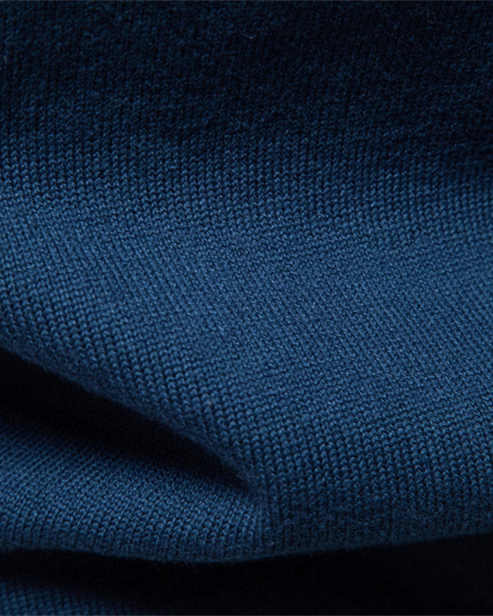 Men's elevated crewneck sweater in forest green, featuring a unique textured knit.