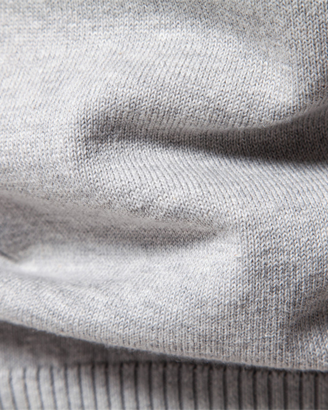 Men's classic crewneck sweater, elevated with a unique textured knit for versatility.