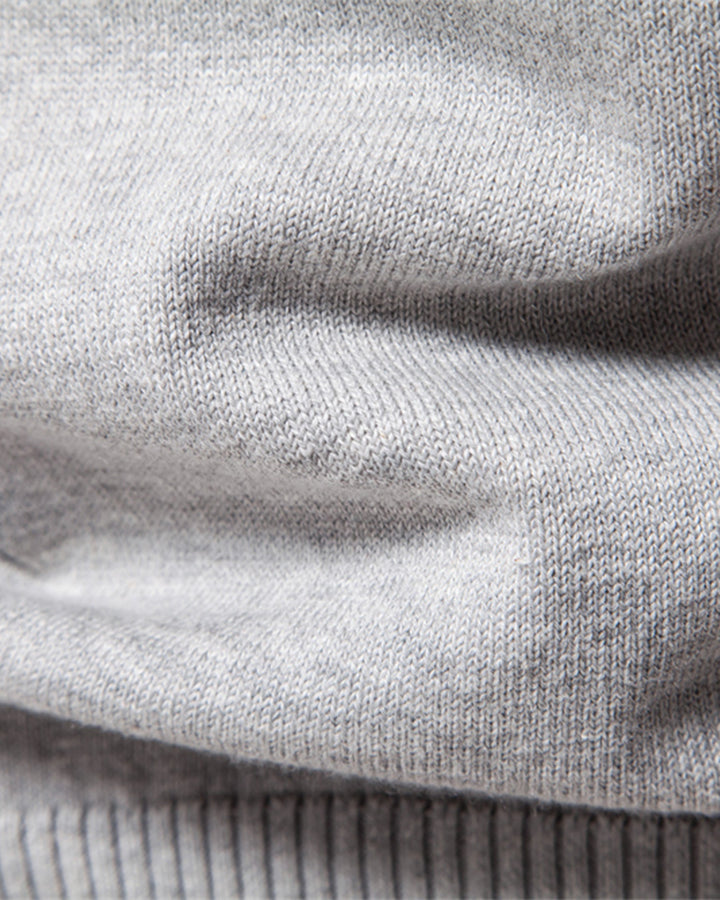 Men's classic crewneck sweater, elevated with a unique textured knit for versatility.
