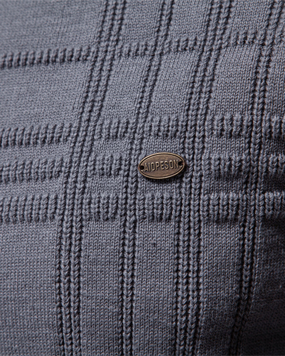 Full view of a men's versatile textured crewneck sweater in a deep navy color.