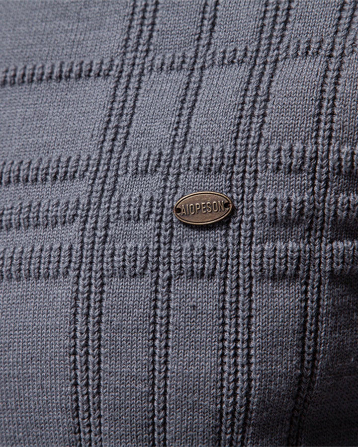 Full view of a men's versatile textured crewneck sweater in a deep navy color.