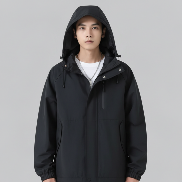 Close-up of a men's Elia windbreaker jacket, showing breathable fabric for weather protection.