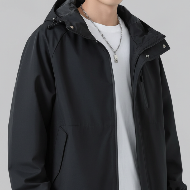 Stylish man wearing an Elia lightweight windbreaker jacket, perfect for casual and sports wear.