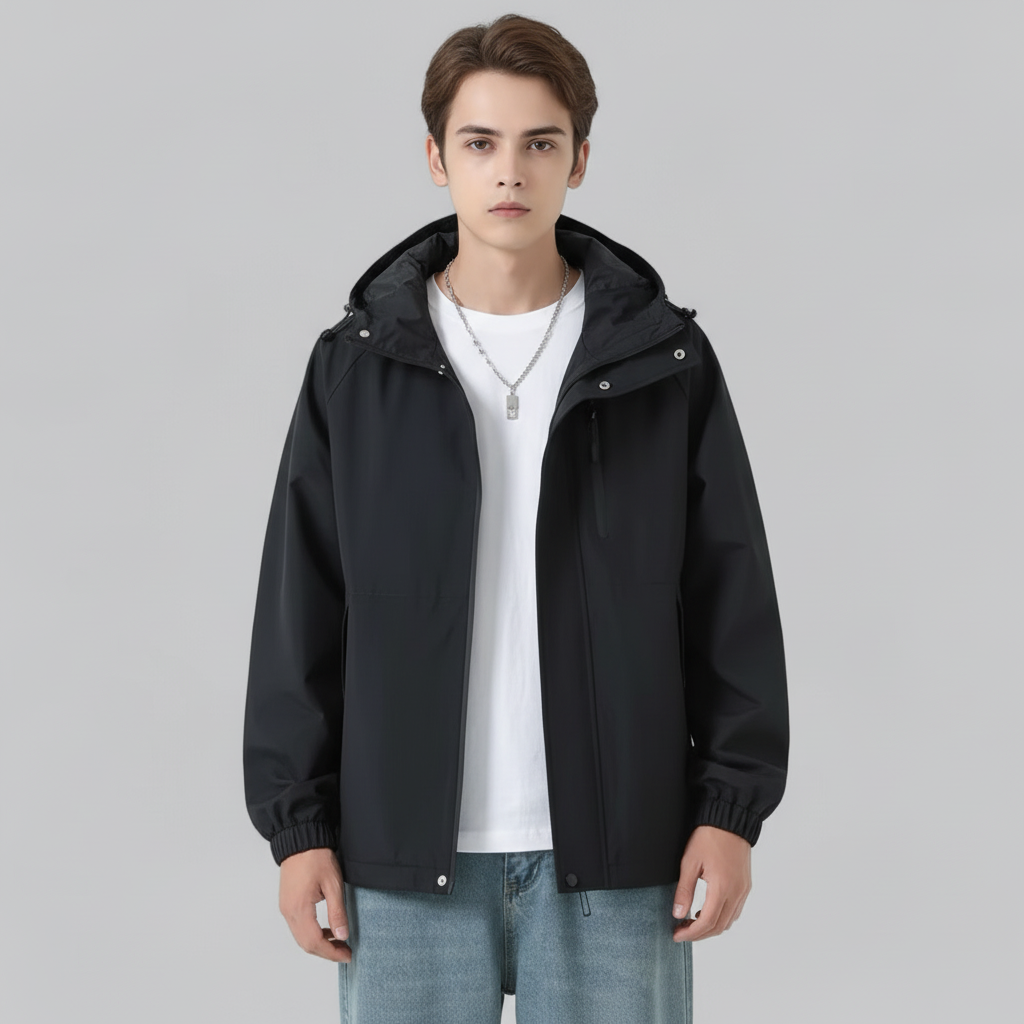 Wind-resistant men's Elia jacket in a folded position, highlighting its lightweight and packable design.