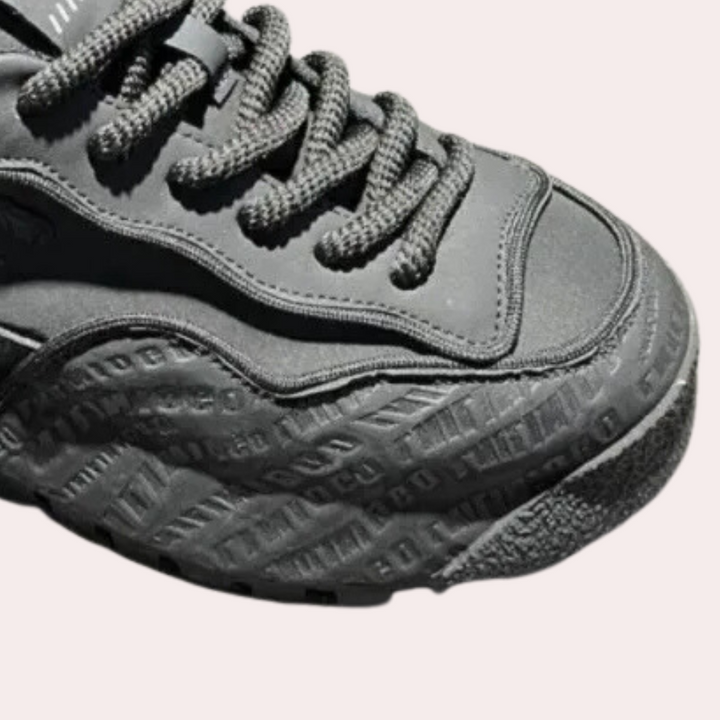 Stylish men's black Elias casual sneakers, versatile & lightweight for modern everyday fashion.