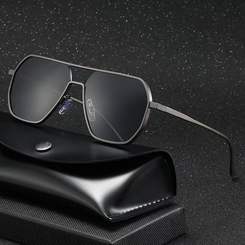 Stylish men's aviator sunglasses featuring a modern geometric steel frame and UV400 lenses for fashion eyewear.