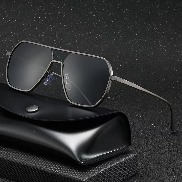 Stylish men's aviator sunglasses featuring a modern geometric steel frame and UV400 lenses for fashion eyewear.