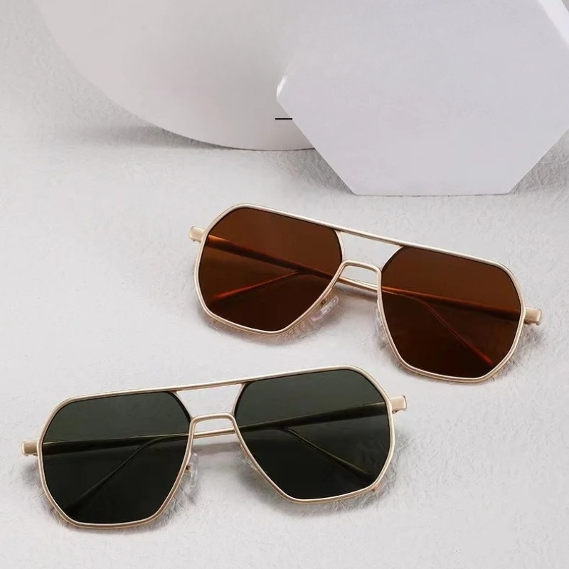 Durable men's steel frame aviator sunglasses with UV400 protection, offering modern and long-lasting eyewear.