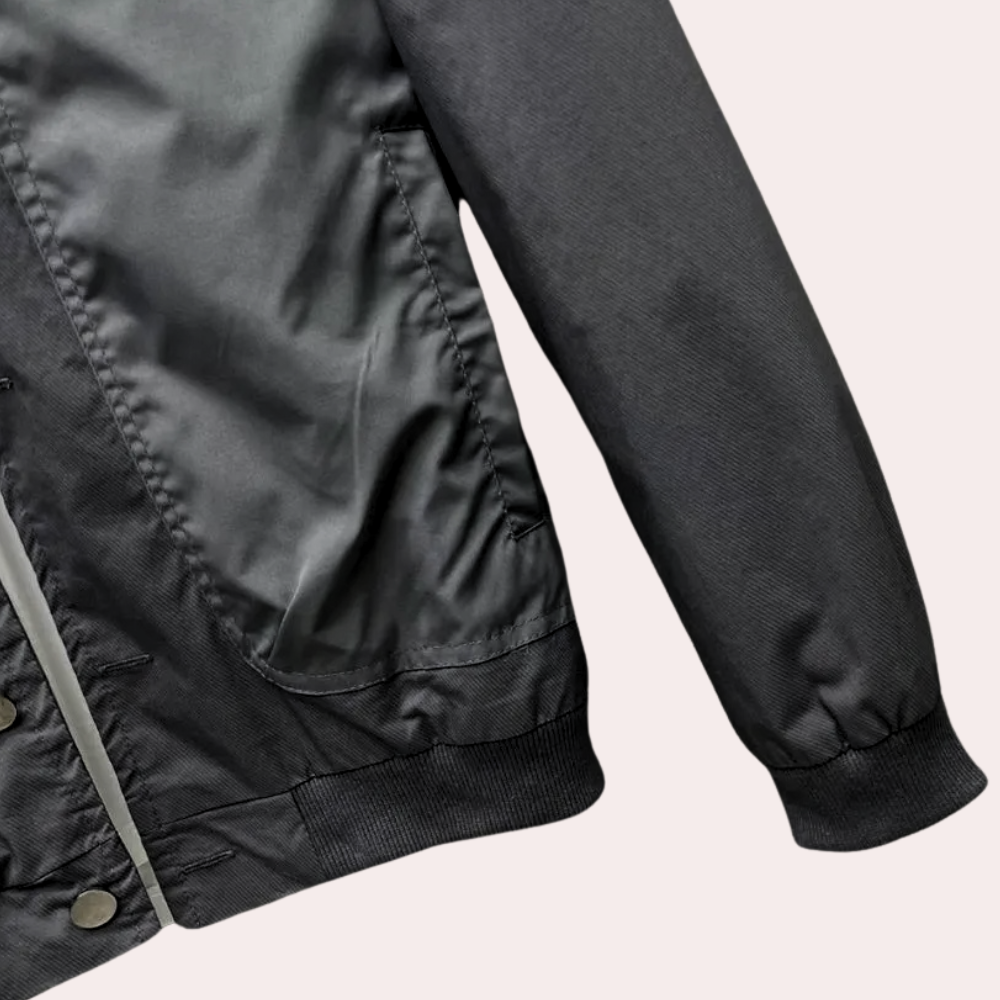Modern black everyday jacket for men. The Elliot coat offers a stylish, comfortable fit, perfect for casual outerwear.