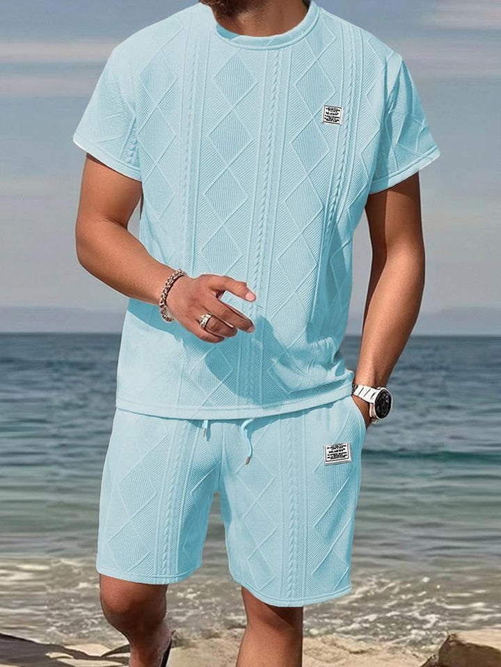 Stylish men's embossed leather patterned top, part of a modern matching set, ideal for fashion-forward looks.