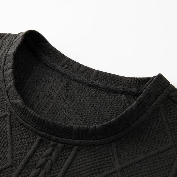 Embossed leather style men's top, patterned for a modern streetwear look, designed as part of a matching fashion set.
