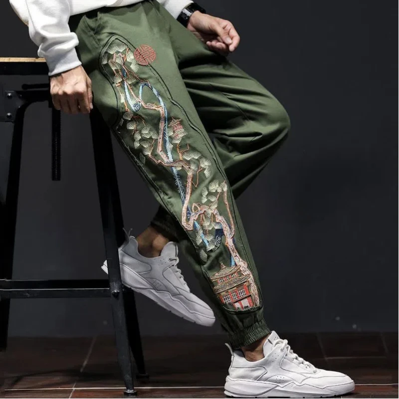 Men's embroidered bonsai joggers in an urban comfort style, perfect for streetwear and casual wear.