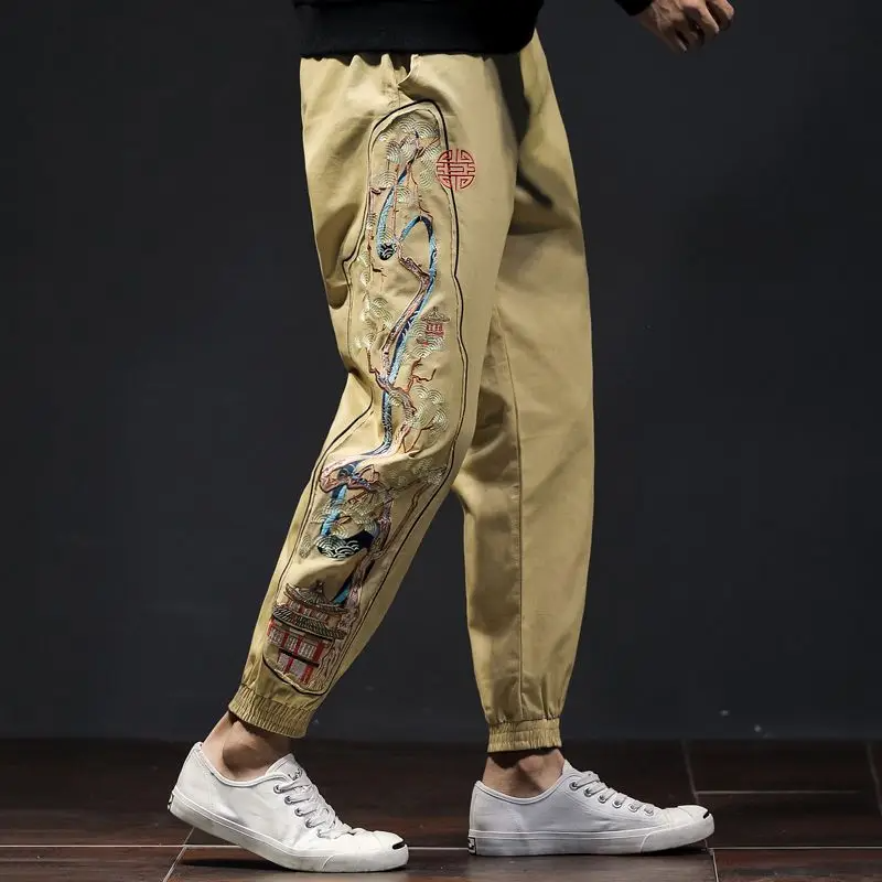 Comfortable men's joggers with unique embroidered bonsai design, ideal for casual, athletic or streetwear.