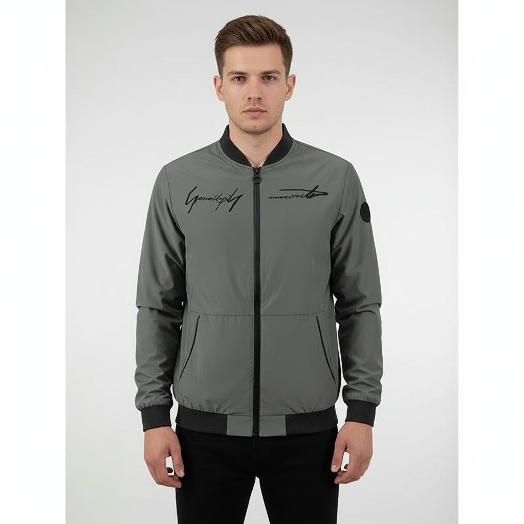 Close-up of men's Silas bomber jacket embroidery, detailed stitching, lightweight
