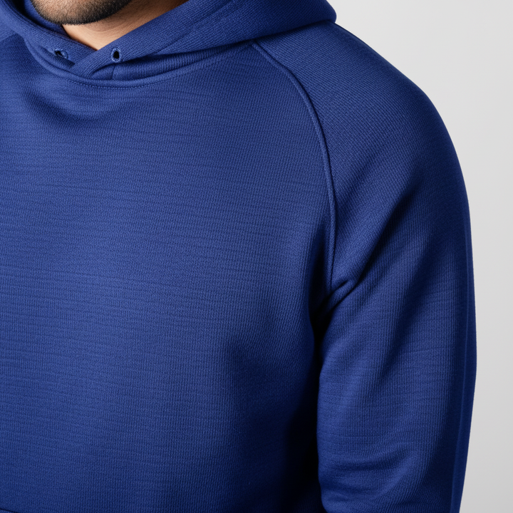 Close-up of the textured fabric on the men's Eric zip-up hoodie, perfect for athletic wear