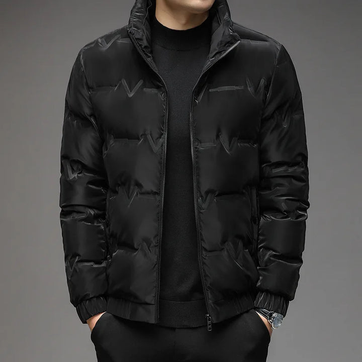 Stylish gray Men's Everest Puffer Jacket. Warm, insulated outerwear for cold weather fashion.