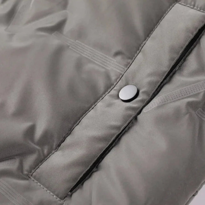 Man wearing Men's Everest Puffer Jacket. Comfortable, warm outerwear for cold weather outdoor activities.