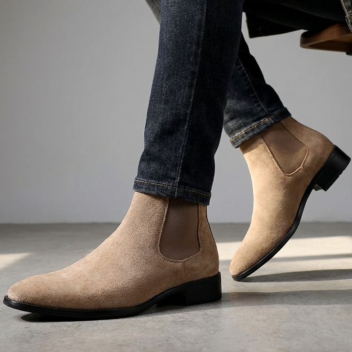 Stylish black men's slip-on Chelsea boots, ideal for confident everyday and work wear.