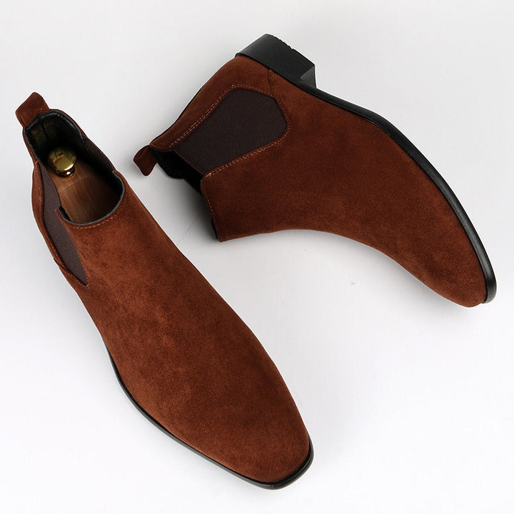 Rugged brown men's Chelsea boots, offering everyday comfort, durability, & a confident look.