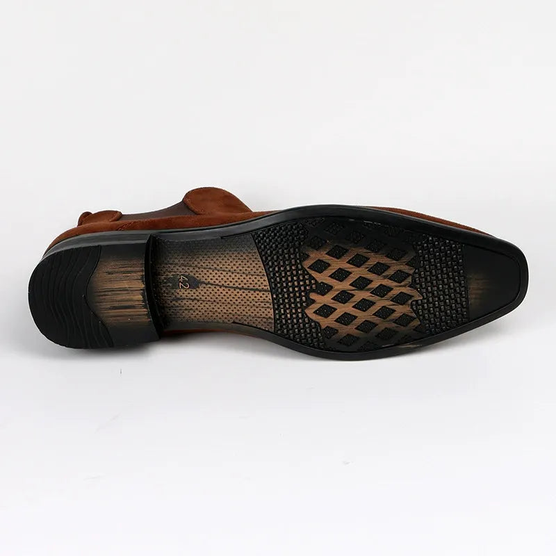Close-up of durable black men's Chelsea boots, highlighting quality construction & everyday comfort.