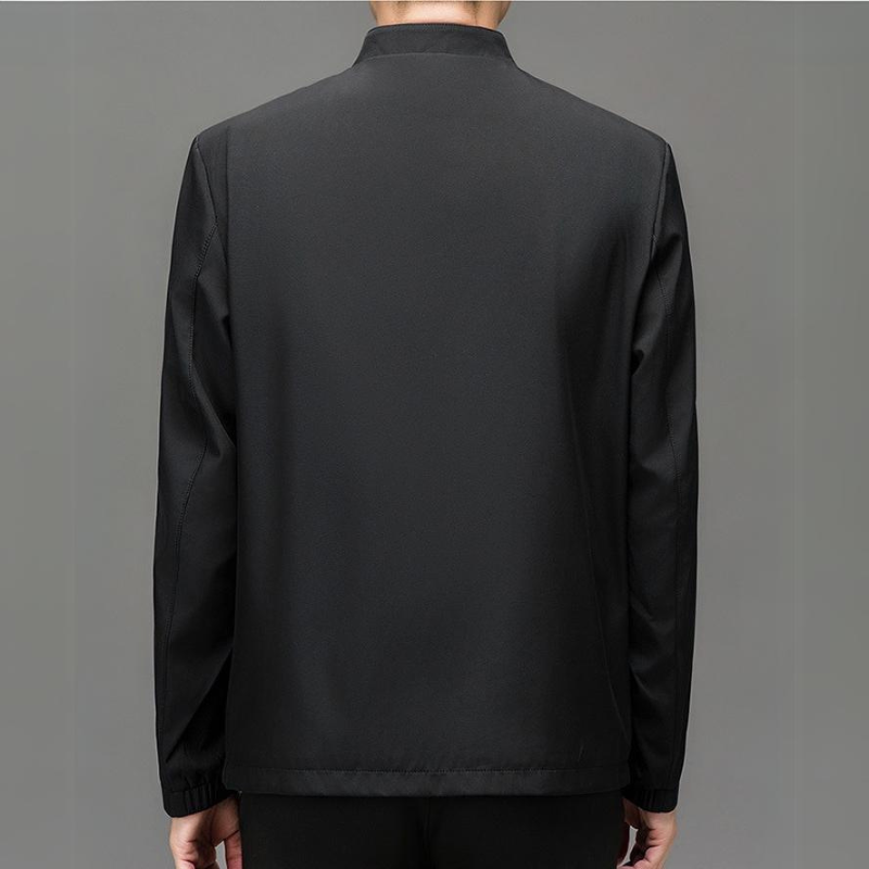 Beige men's tailored comfort jacket, casual yet sleek, featuring practical zippered pockets.