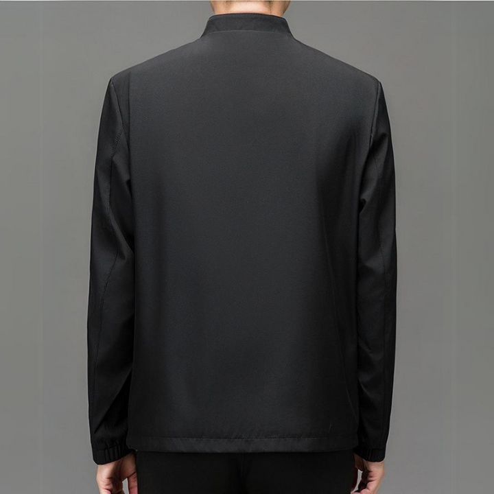 Beige men's tailored comfort jacket, casual yet sleek, featuring practical zippered pockets.