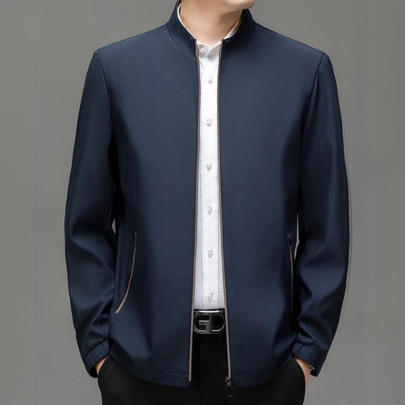 Lightweight beige men's jacket with zippered pockets for a sleek look and everyday fashion.