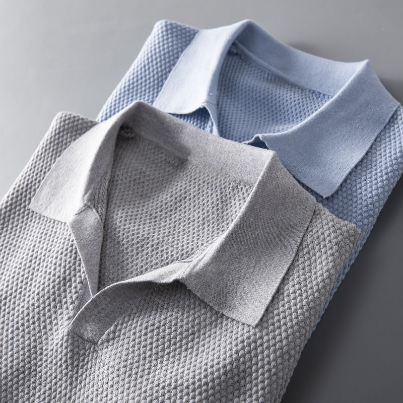 Close-up of soft fabric on a Men's Everyday Comfort Polo Shirt, showcasing quality and texture.