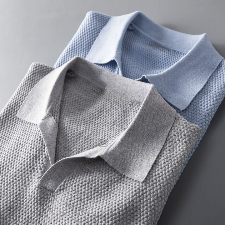 Close-up of soft fabric on a Men's Everyday Comfort Polo Shirt, showcasing quality and texture.