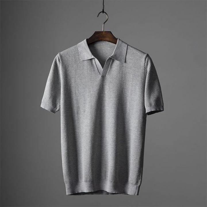 Back view of a Men's Everyday Comfort Polo Shirt, highlighting the classic fit and versatile style.