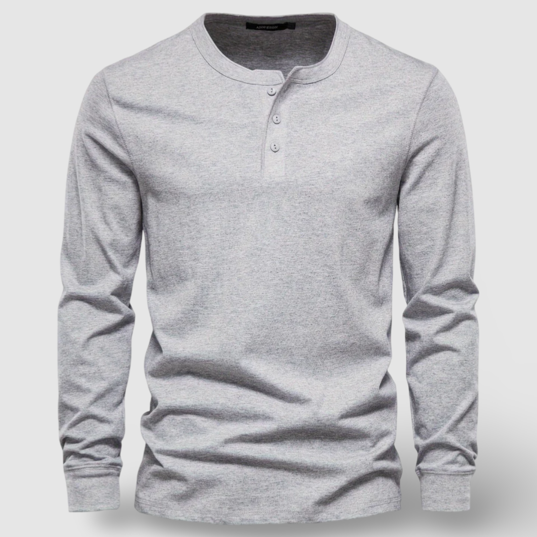 Versatile men's long sleeve henley shirt, great for layering or casual everyday outfits.