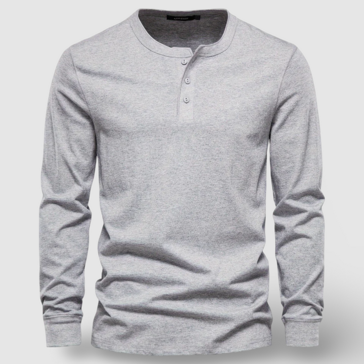 Versatile men's long sleeve henley shirt, great for layering or casual everyday outfits.