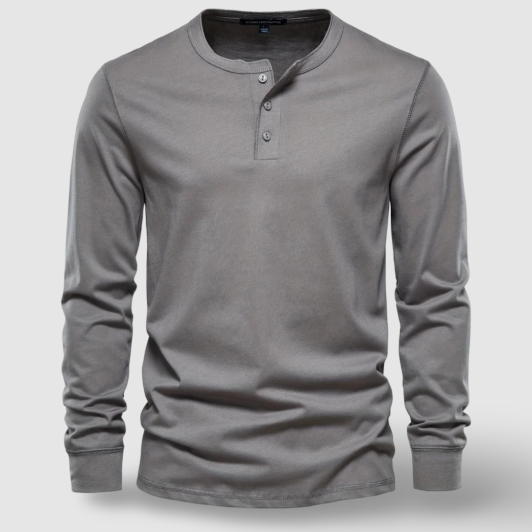 Man wearing a comfortable long sleeve henley shirt, perfect for an everyday casual look.