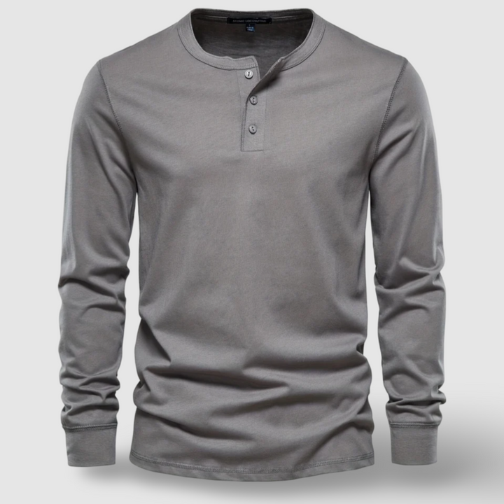 Man wearing a comfortable long sleeve henley shirt, perfect for an everyday casual look.