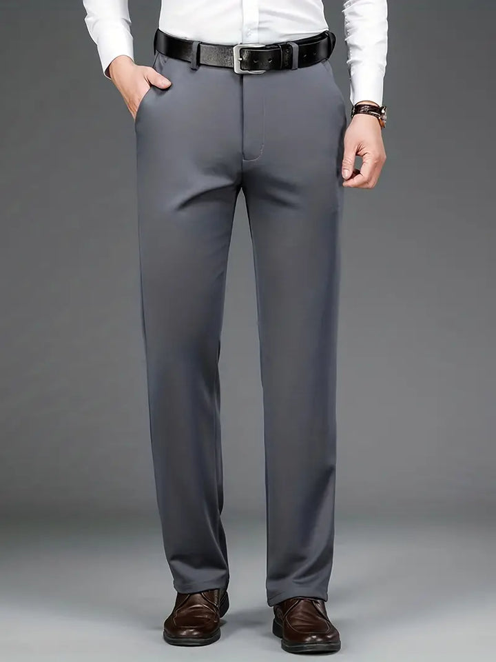 Versatile men's stretch trousers with ExecFlex technology, ideal for business, travel, and everyday wear.